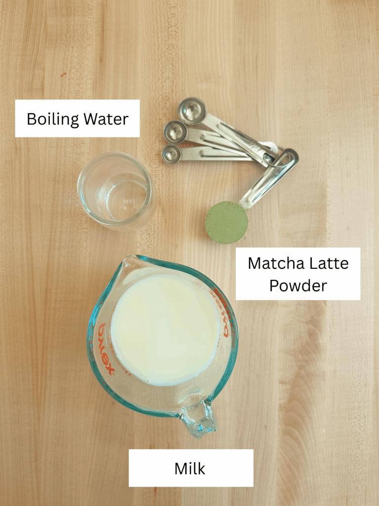 Matcha latte ingredients. Including: Boiling water, matcha latte powder, and milk.
